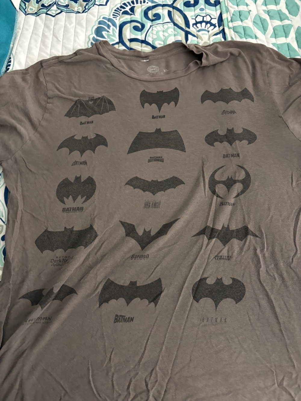 DC Comics Brown Short Sleeve Batman Logos Through The Years T-shirt